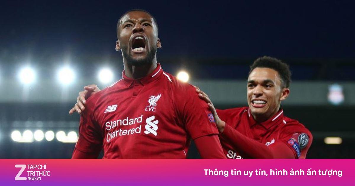 Các cầu thủ Liverpool ăn mừng cuồng nhiệt cùng CĐV The Kop sau bàn thắng vào lưới Barcelona tại Anfield trong trận bán kết Champions League 2019.